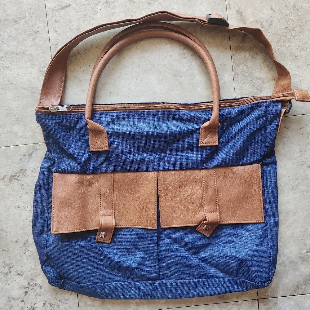 Denim blue zip canvas bag 2 tan snap pockets, handles & long adjustable strap